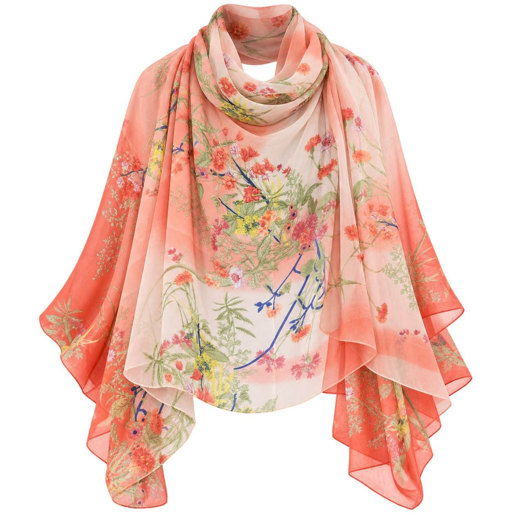 A lightweight peach and coral scarf with a watercolor-style floral print in green, yellow, red, and blue, draped to show its flowy, semi-sheer texture against a plain white background.
