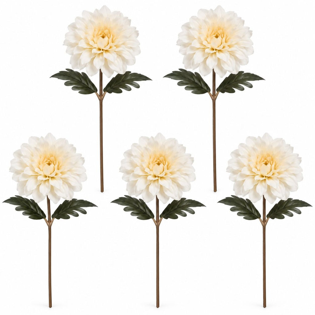 Five artificial dahlia flowers with cream-white petals, dark green leaves, and brown stems, arranged on a plain white background.