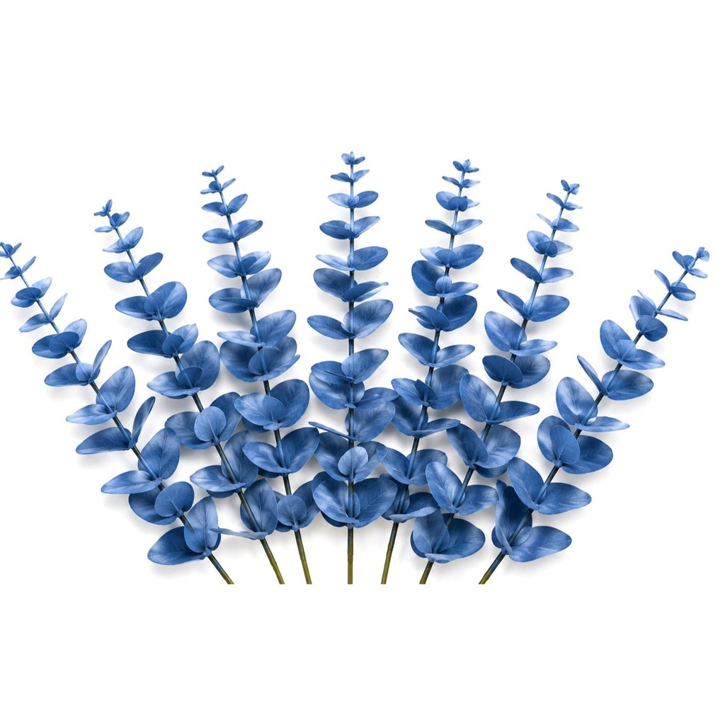 Set of blue artificial eucalyptus branches on a white background