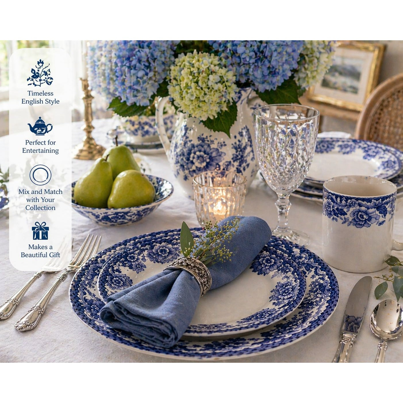 Spode Delamere Blue complete place setting on formal dining table with blue hydrangeas silver candlesticks and crystal glasses
