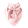 Pink satin scarf with a bow on a white background