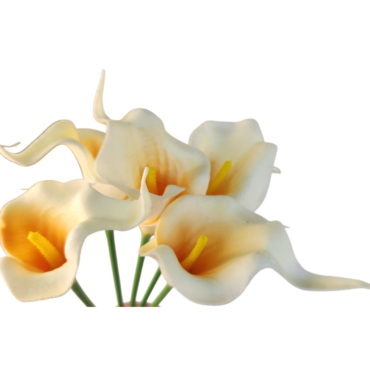 A cluster of artificial calla lilies with cream-white petals, warm yellow-orange centers, and green stems on a plain white background.