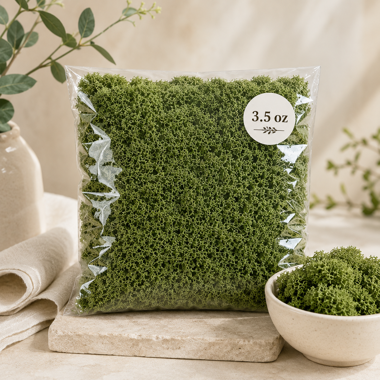 Packaged green moss on a wooden board with a beige background size image of 3.5 oz