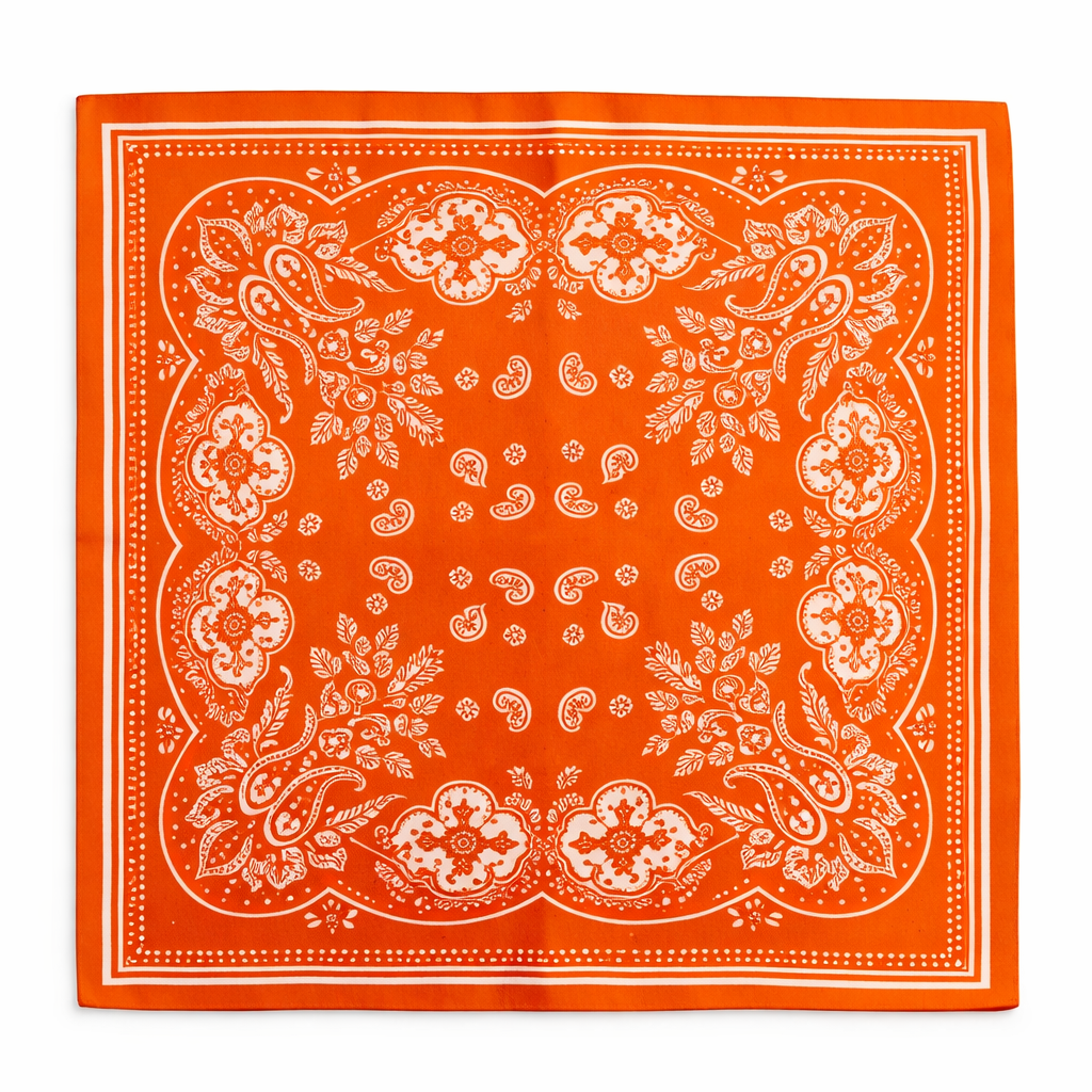 Orange bandana with white paisley pattern on a white background