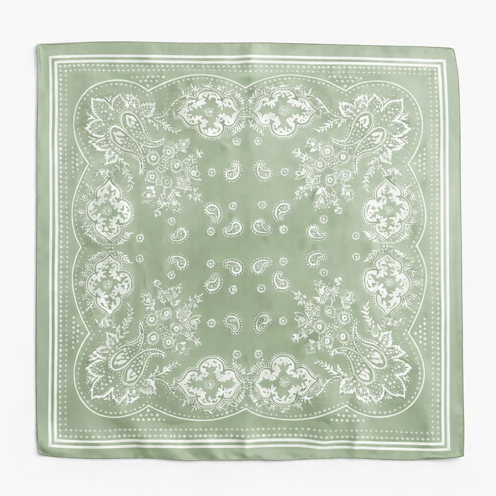Green bandana with white paisley pattern on a white background
