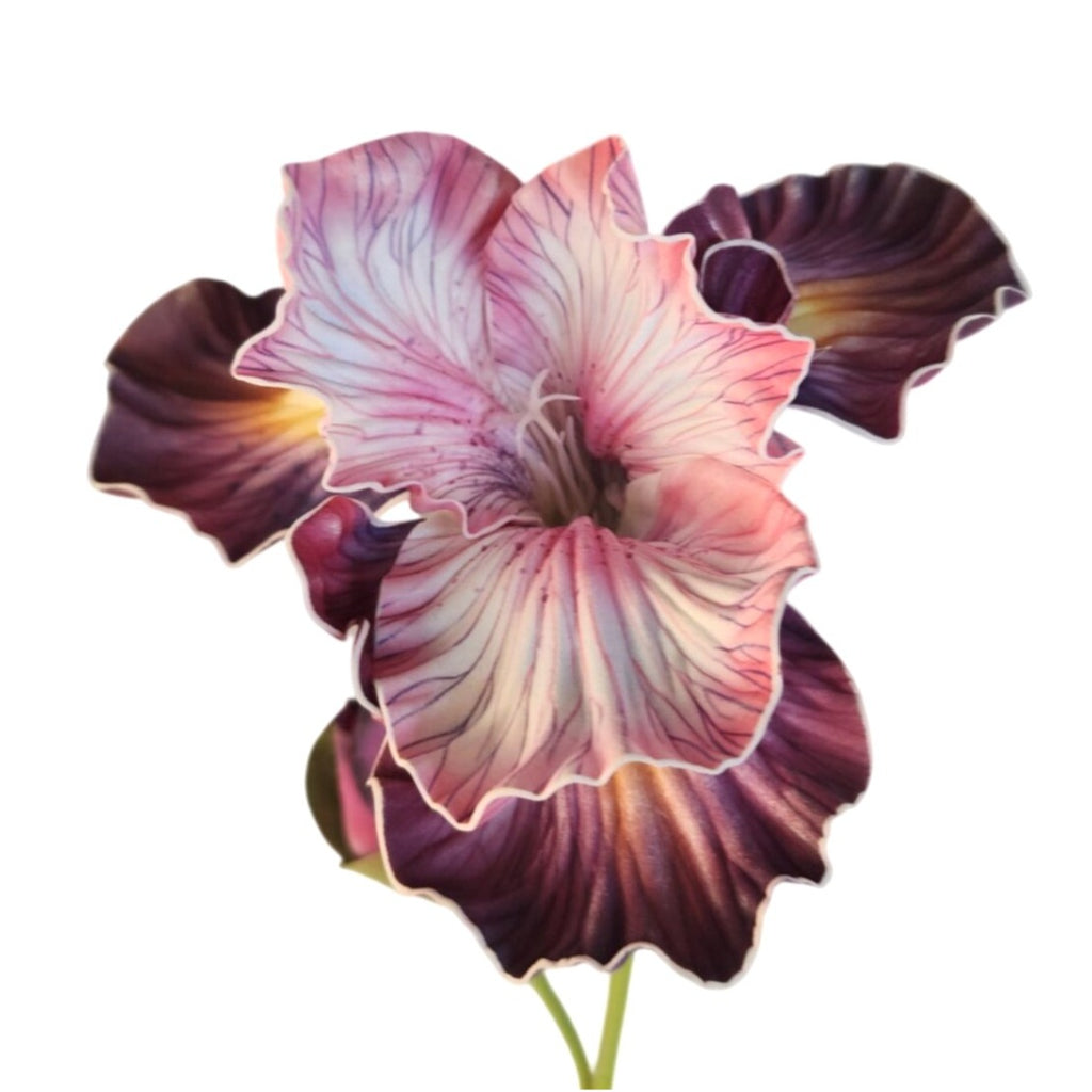 A single artificial-looking flower with layered ruffled petals in pink, white, and deep purple tones, shown against a plain white background.