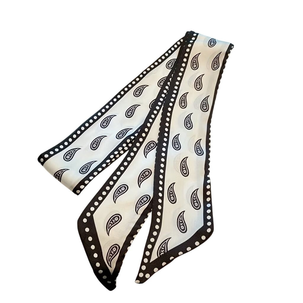 Black and white patterned scarf on a white background