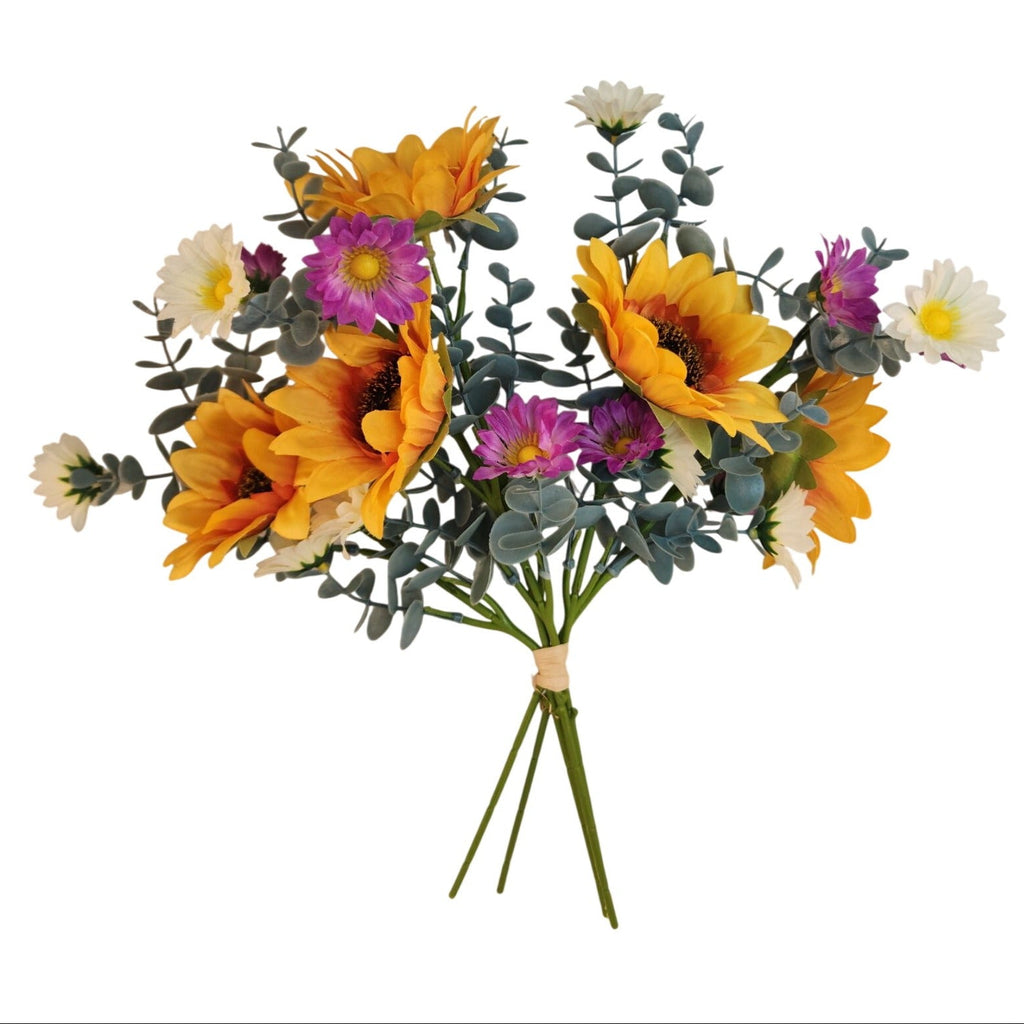 Bouquet of artificial flowers with sunflowers and other colorful blooms on a white background