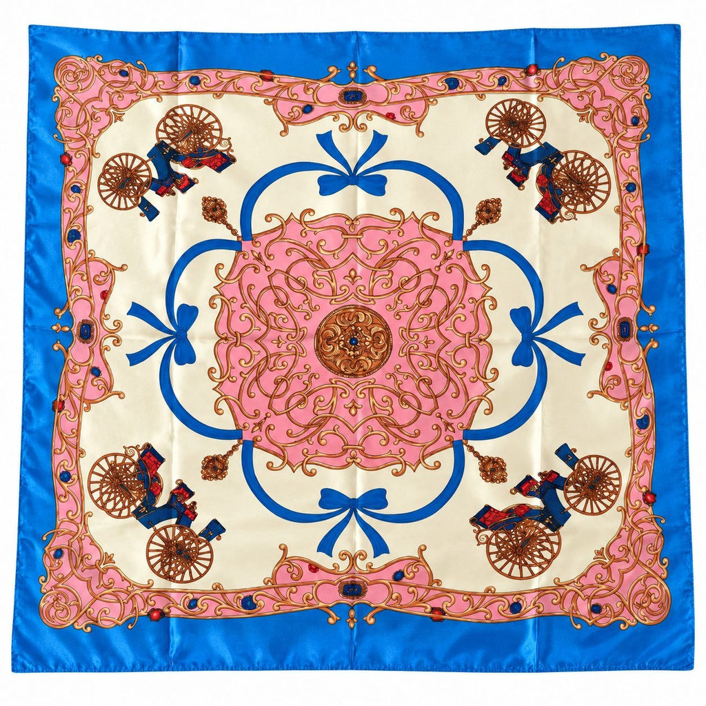 A square silk scarf featuring a vibrant French Chantilly-style pattern with a central pink medallion, blue accents, and pink and gold decorative cartouches with figures.