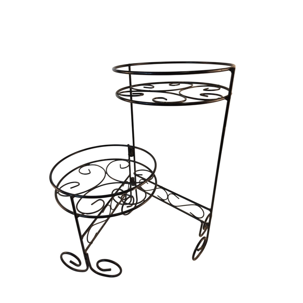 A black wrought iron double-tier plant stand with decorative scrollwork, shown against a plain white background.