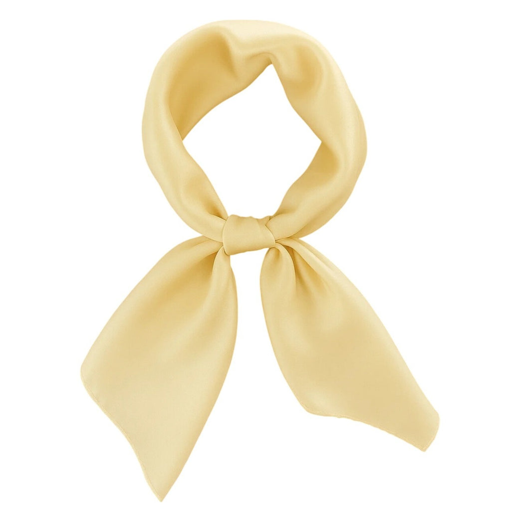 Yellow scarf tied in a knot on a white background