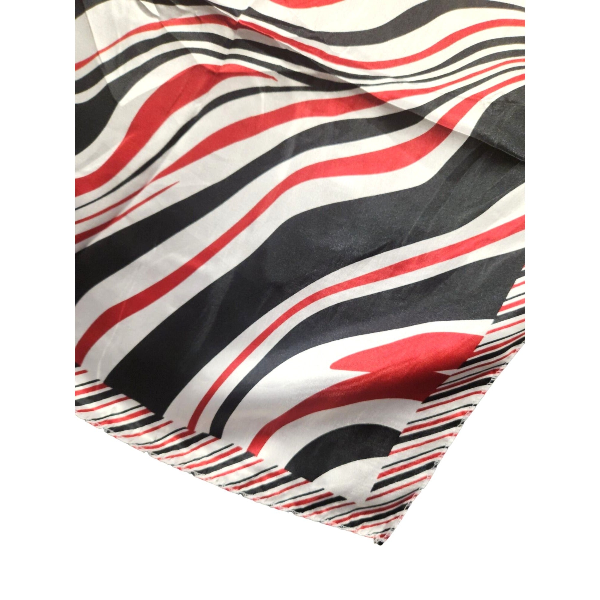 Striped fabric with black, red, and white pattern on a white background