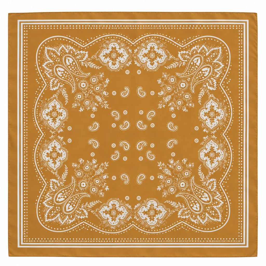 A square bandana in a warm mustard yellow color with a detailed white paisley and floral border pattern, shown flat against a white background.