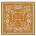 A square bandana in a warm mustard yellow color with a detailed white paisley and floral border pattern, shown flat against a white background.