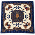 A square silk scarf featuring a classic baroque-style design with a cream center, navy blue borders, gold scrollwork, and small red-and-black carriage motifs.