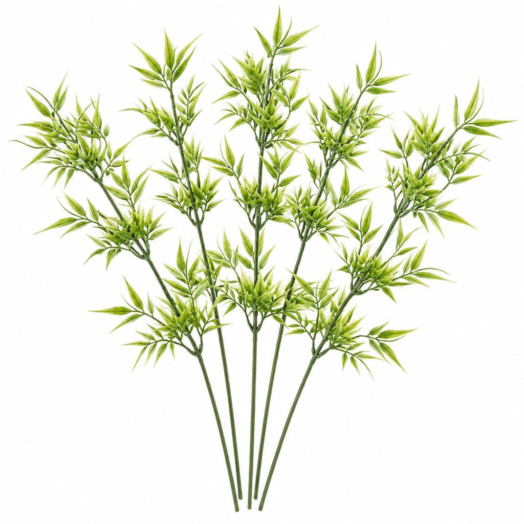 Artificial bamboo plant with multiple green stems and leafy branches, isolated on a white background.