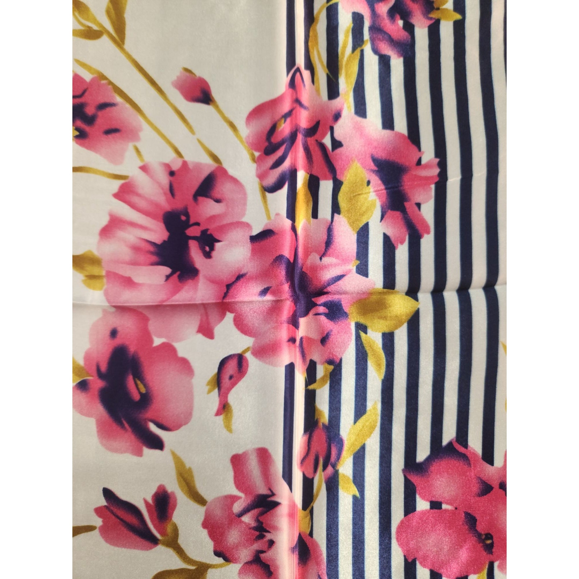 Floral and striped fabric pattern with pink flowers and navy stripes.