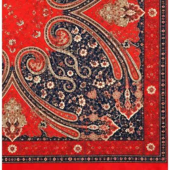 Decorative red and blue patterned fabric with intricate designs