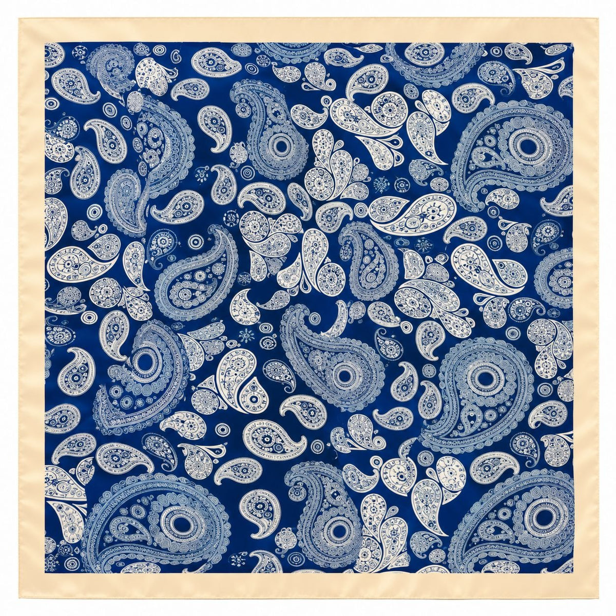 A square scarf with a detailed blue and white paisley pattern, finished with a solid beige border, shown flat against a white background.