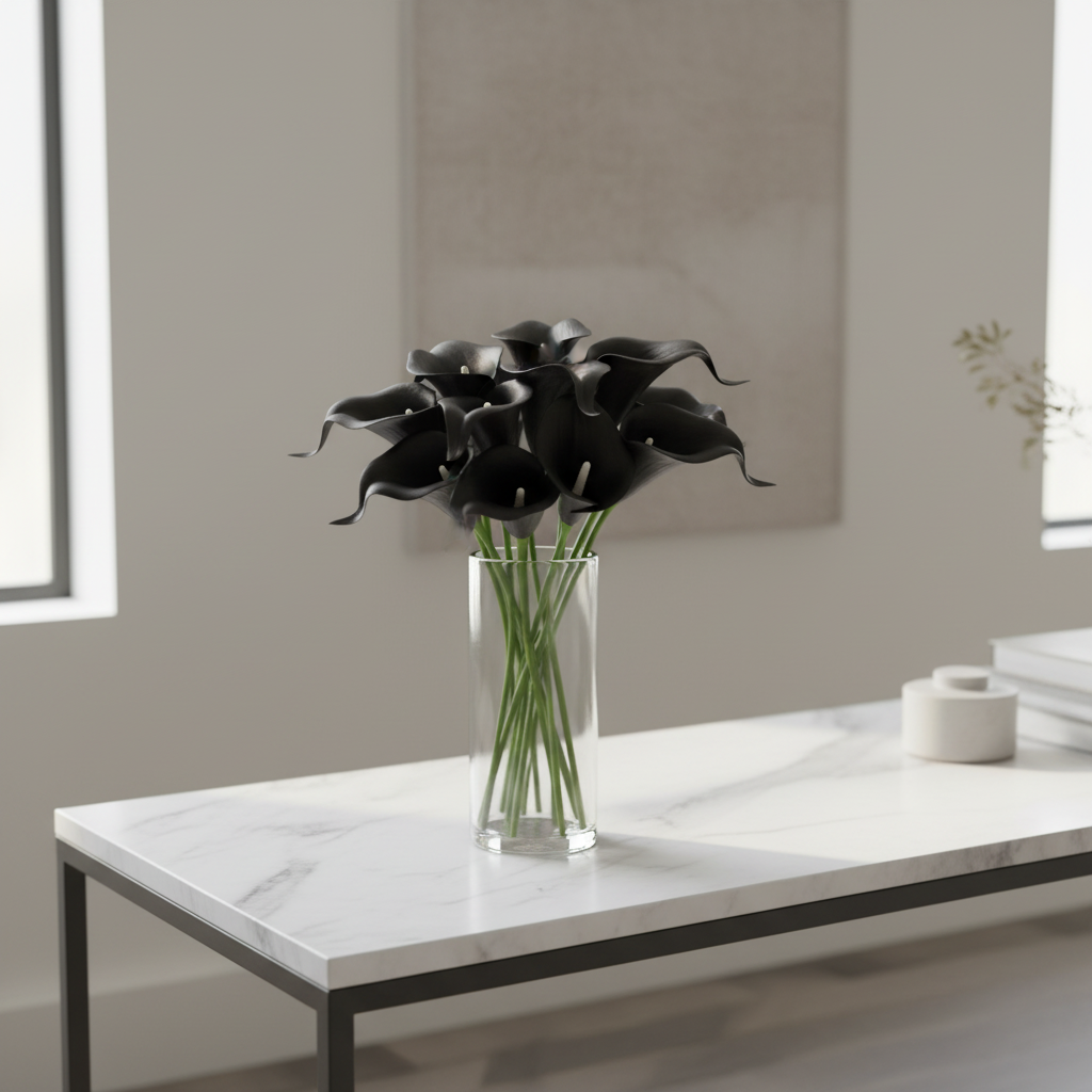 Black calla lily faux flowers arranged in clear glass vase on white marble console table, modern minimalist home decor
