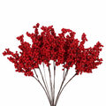 13 red artificial berry picks on white background