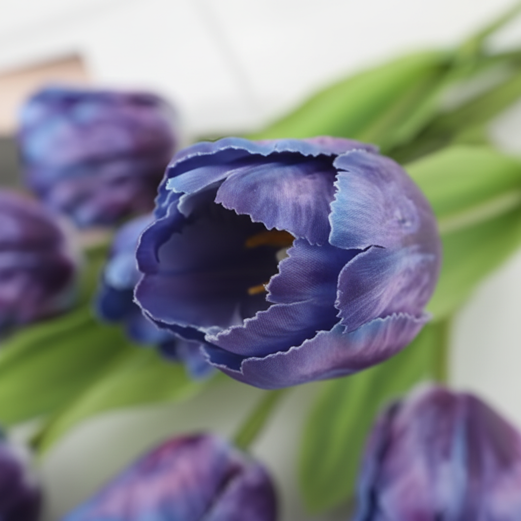 Close-up macro detail of artificial purple gradient tulip showing ruffled layered petal tips and realistic texture