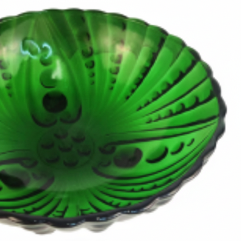 Close-up detail of vintage Anchor Hocking green footed bowl showing embossed bubble and swirl Burple pattern texture in emerald glass with scalloped edge