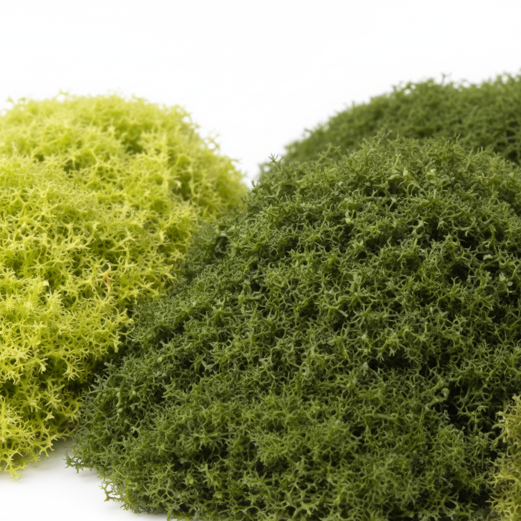 Close-up texture detail of three shades of artificial faux moss light medium and dark green
