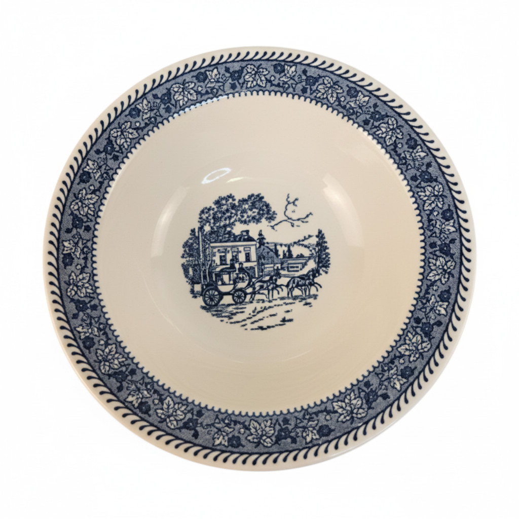 Vintage Homer Laughlin Stratwood bowl Shakespeare Country blue transferware pattern on white background top view