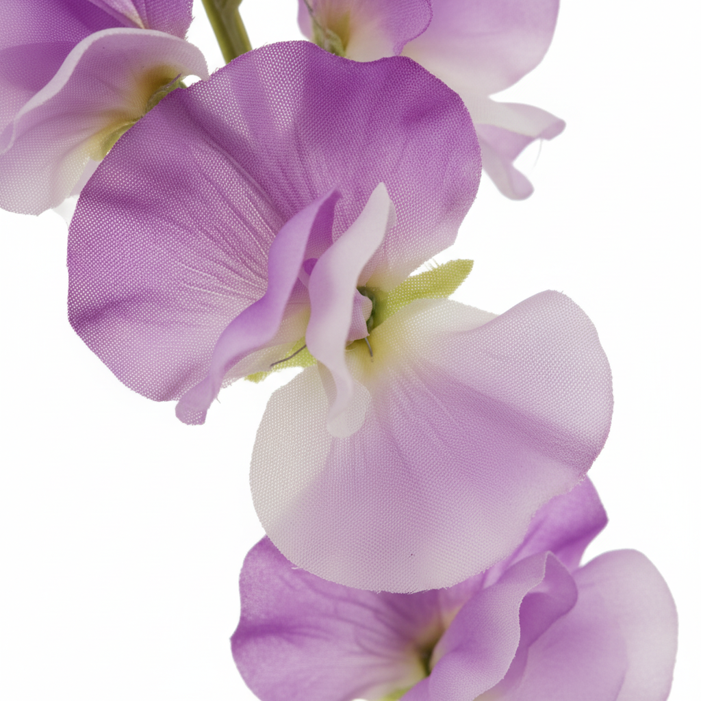 Close-up detail of soft purple sweet pea artificial flower petals showing realistic fabric texture