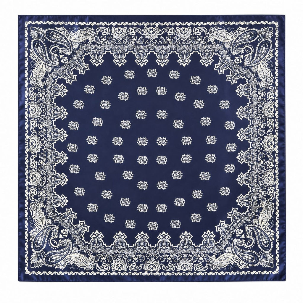 A square navy blue bandana with a detailed white paisley border and a central pattern of small white floral motifs, shown flat against a white background.