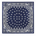 A square navy blue bandana with a detailed white paisley border and a central pattern of small white floral motifs, shown flat against a white background.