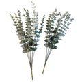 Bundle of 20 artificial baby blue eucalyptus stems with rounded leaves and soft blue green tones for floral arrangements