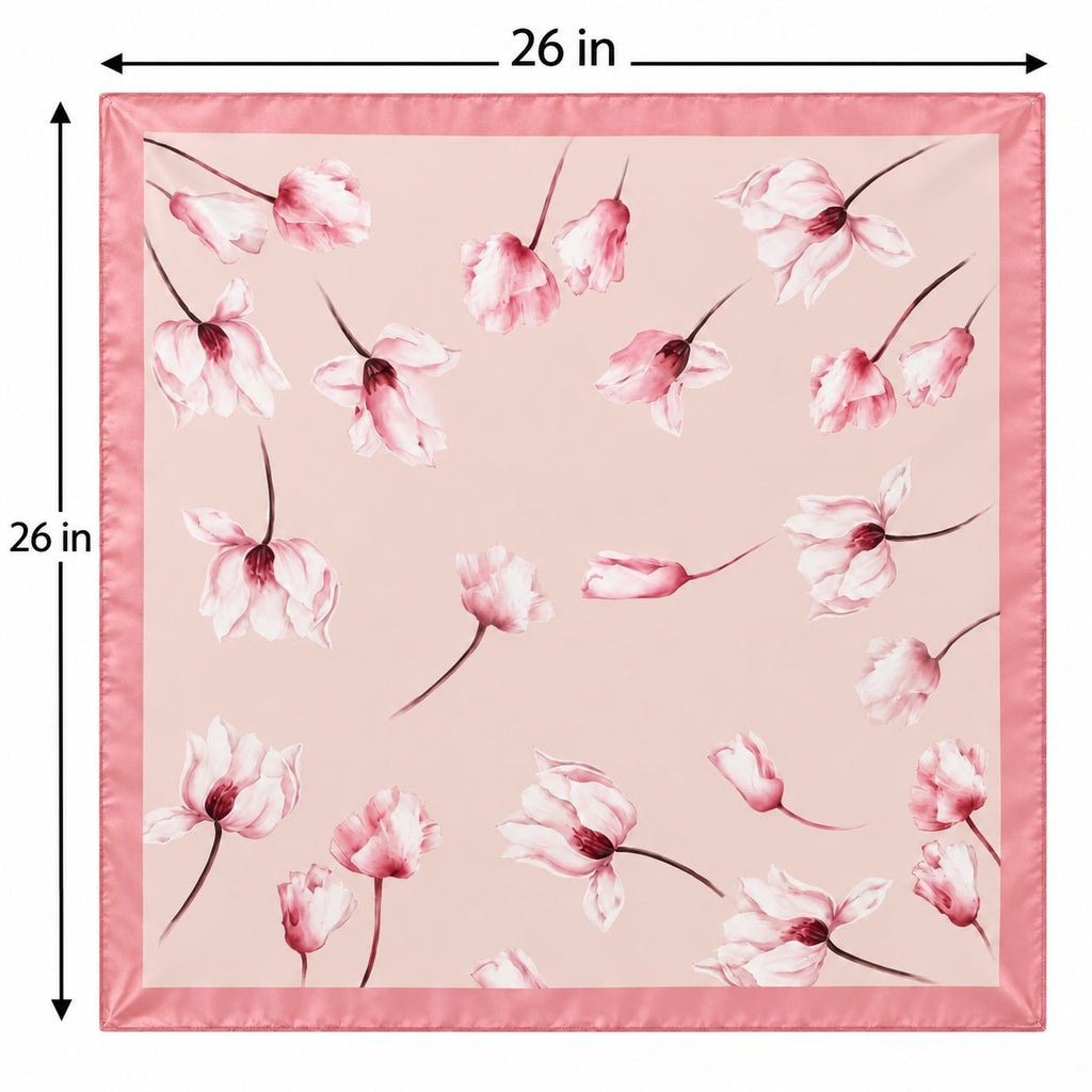A square pink scarf with a watercolor-style floral print and a satin-like border, shown with dimension labels indicating 26 inches on each side.