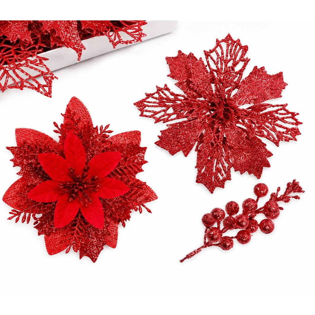 Red glittery floral decorations on a white background